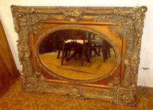 An ornate gilt mirror